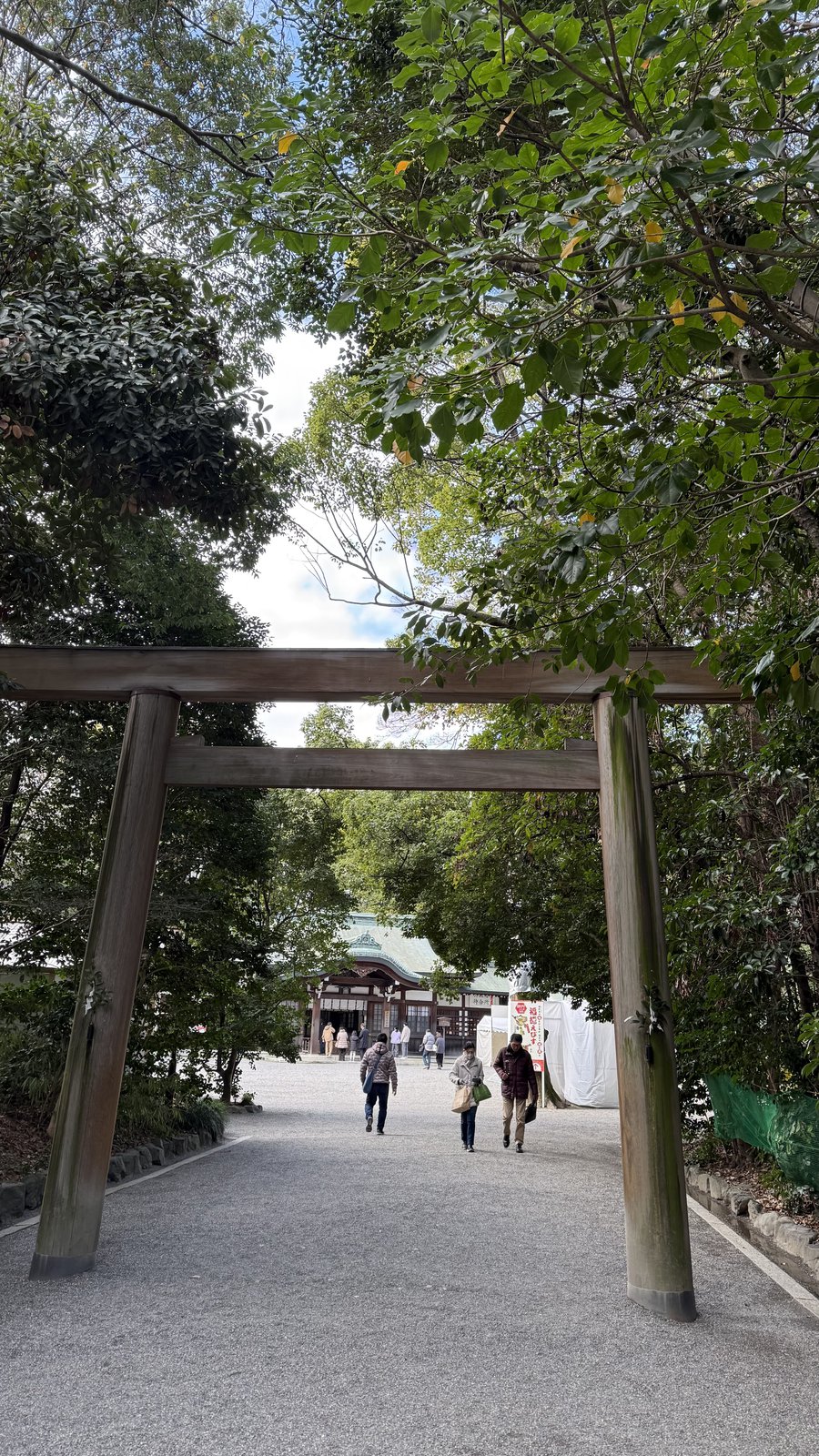 The courtyard with the main hall, seen beyond a wooden torii