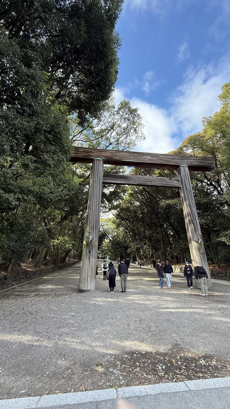 A large wooden torii on the approach