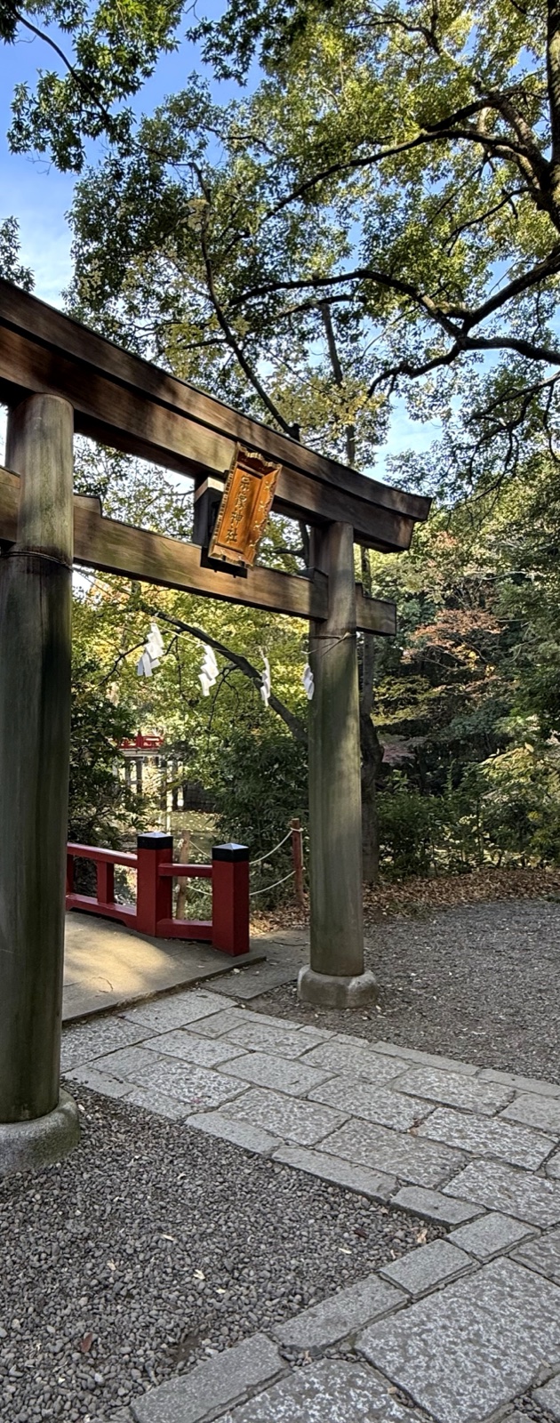 A torii bearing the shrine's name plaque