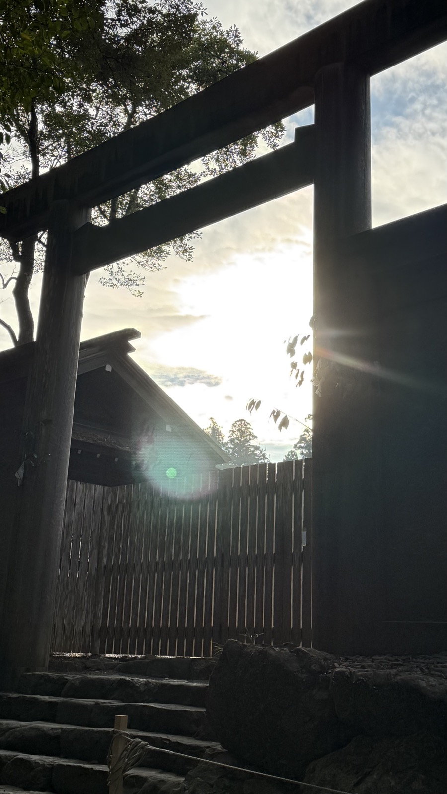 A torii and sacred fence along the approach