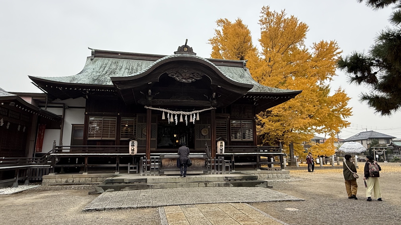 Worship hall and yellow ginkgo leaves