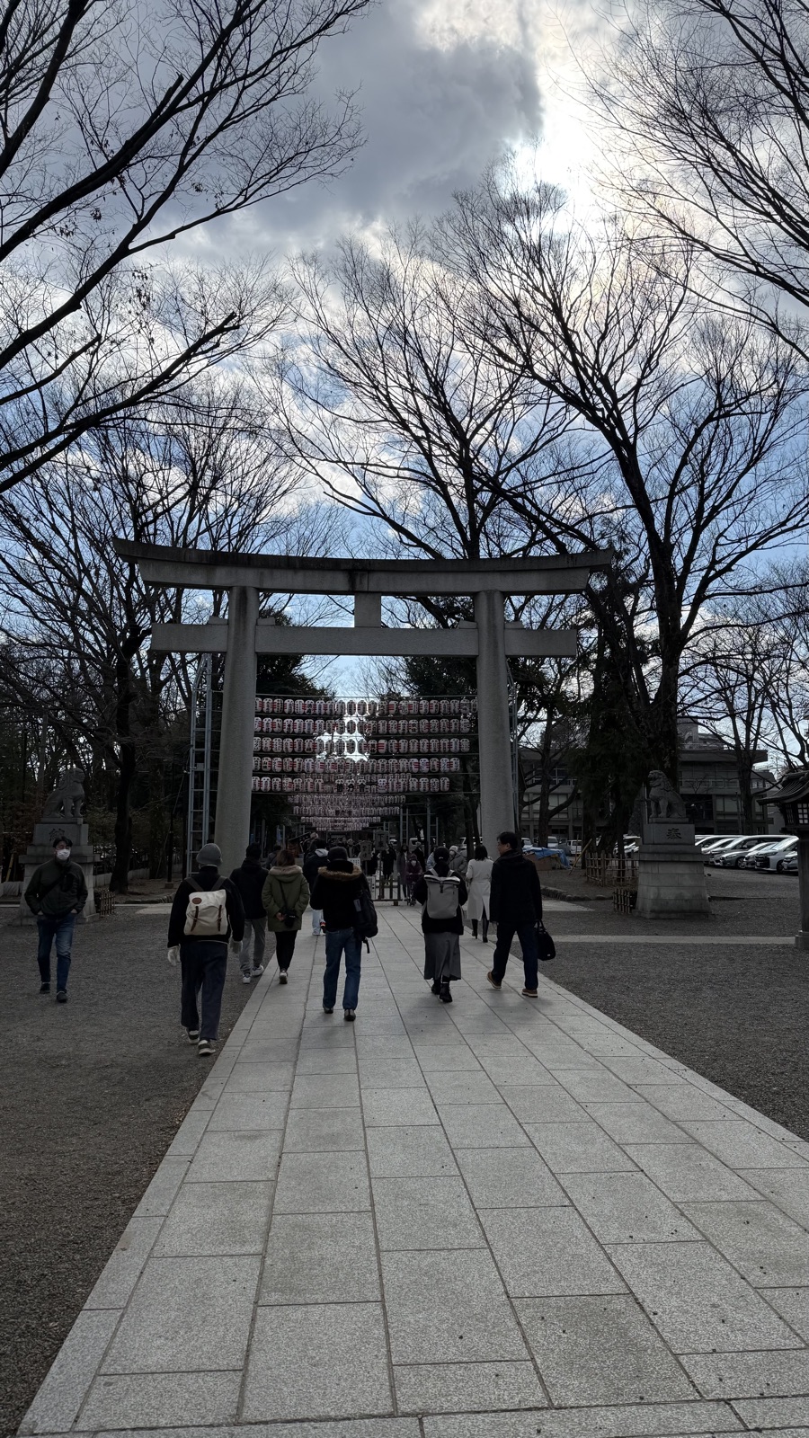 Worshippers passing through the large torii