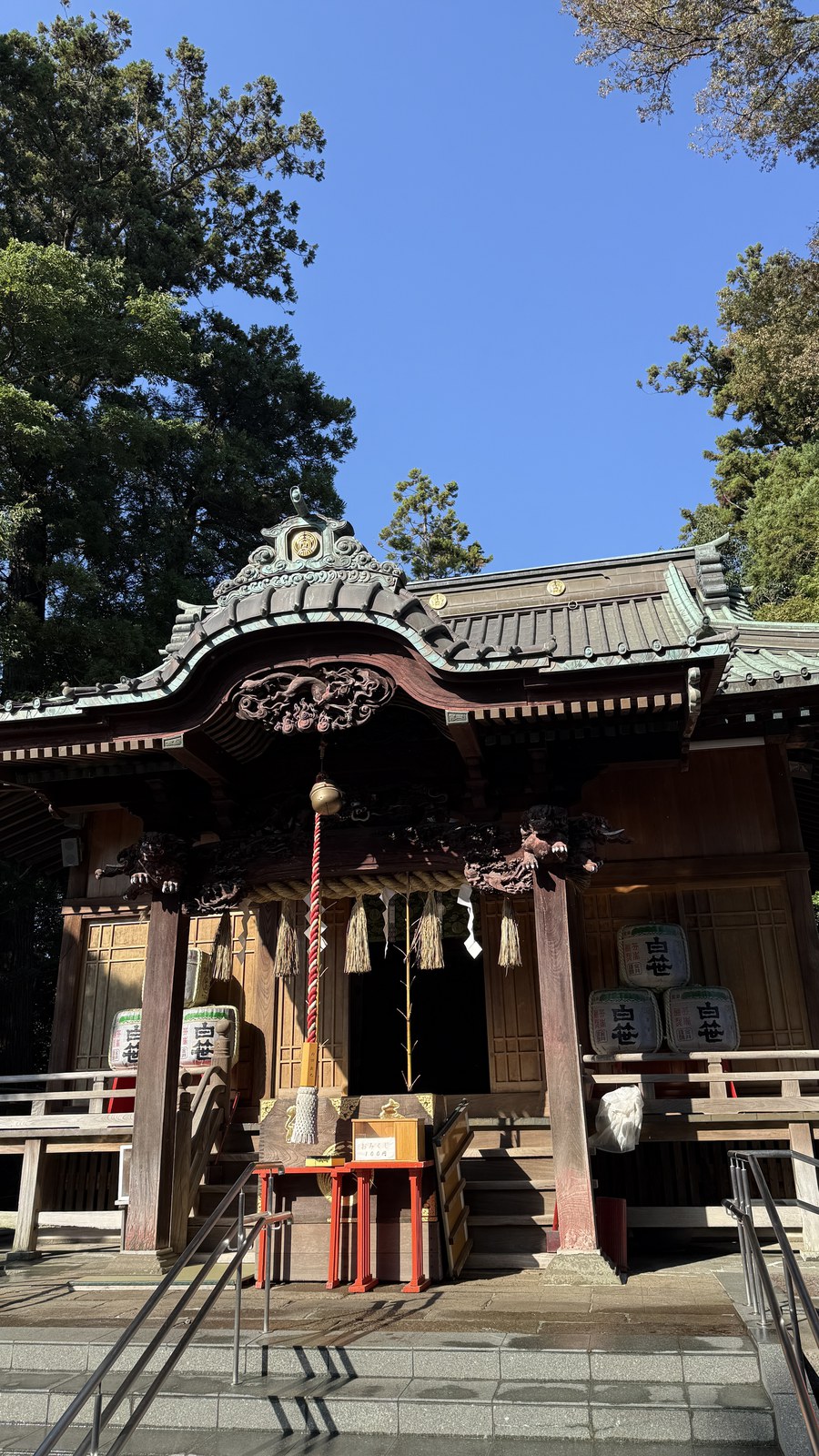 The front of the main hall, with carvings and sake barrels