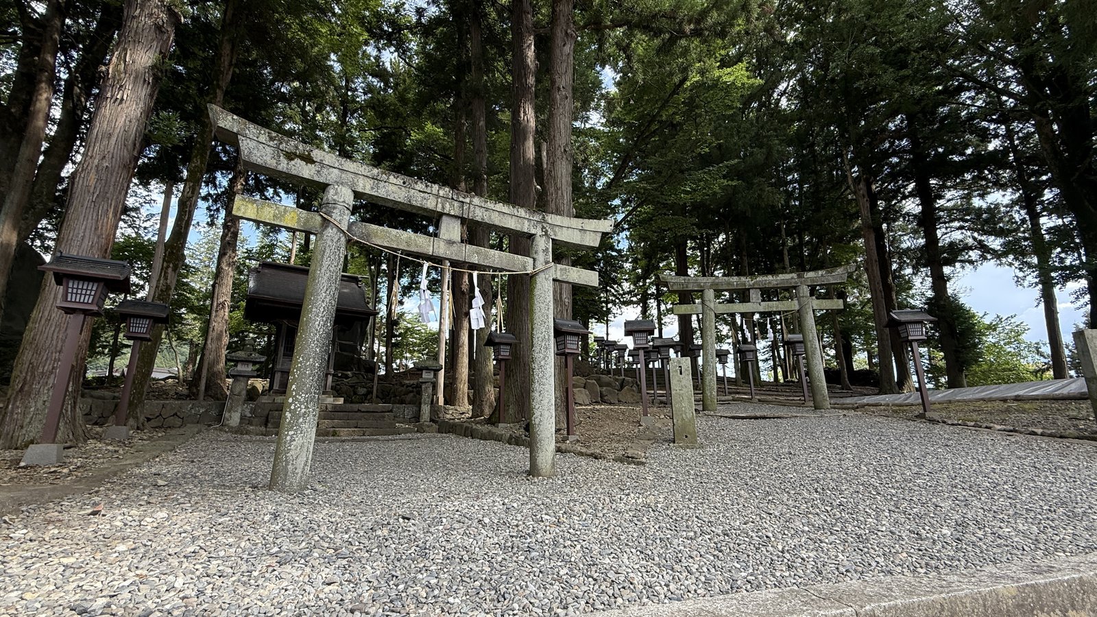 A small precinct with stone torii